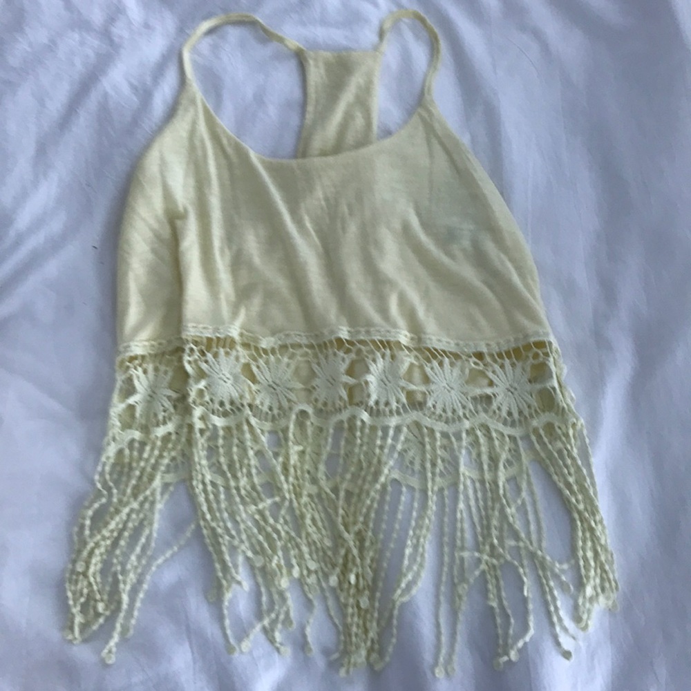 Pale yellow fringe crop top